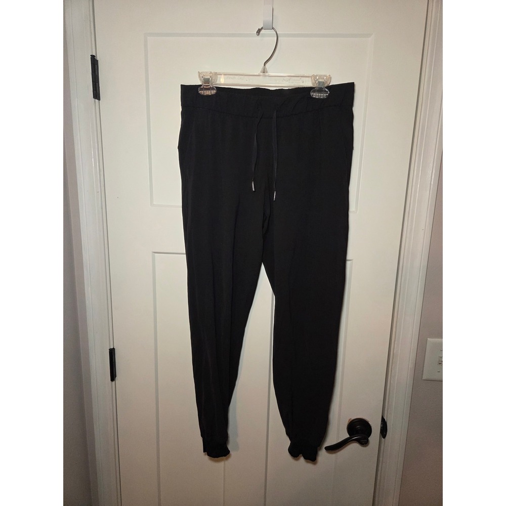 Lululemon On the Fly Jogger Black Luxtreme Pants Size 8 W5CPJS